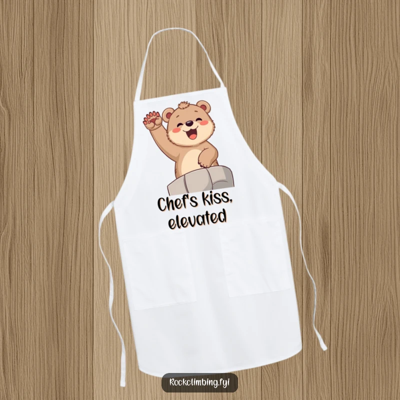 Funny bear cub apron, depicting a joyful cub exuberantly cheering from a high ledge with paws raised, ready for kitchen fun.