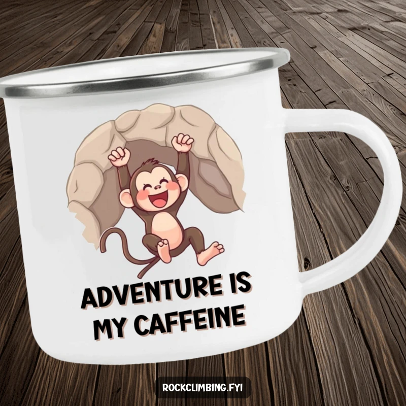 Funny camping mug illustrating a monkey joyfully swinging from a rocky cliff, perfect for outdoor adventures.