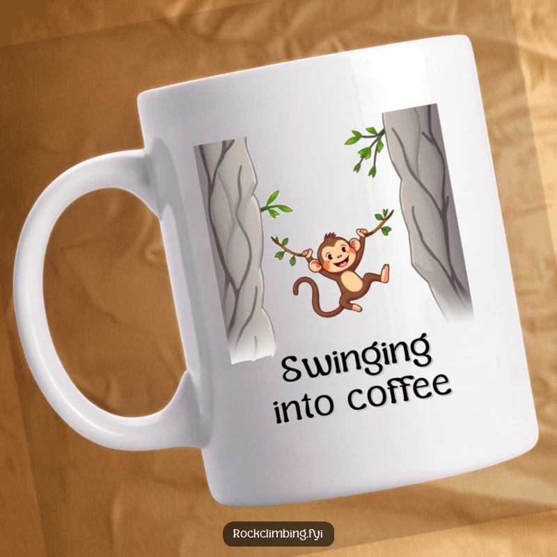Funny Mug featuring a silly monkey joyfully swinging on a vine between two imposing rocky mountain peaks, embodying playful freedom.