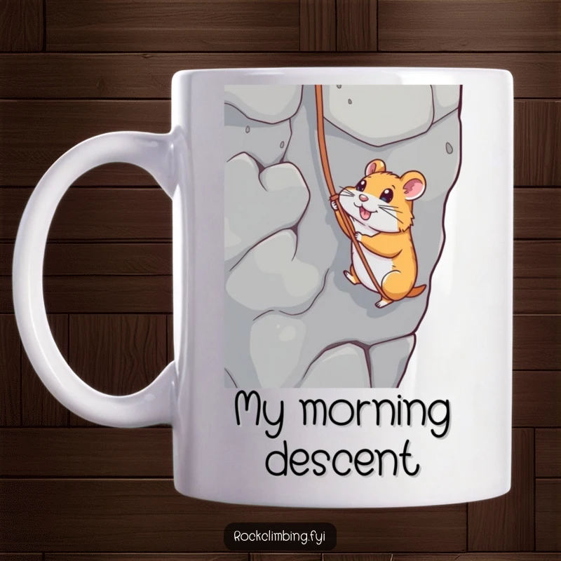 Funny hamster rappelling down a rock face with a string, showcasing extreme courage and adventurous spirit on a coffee mug.