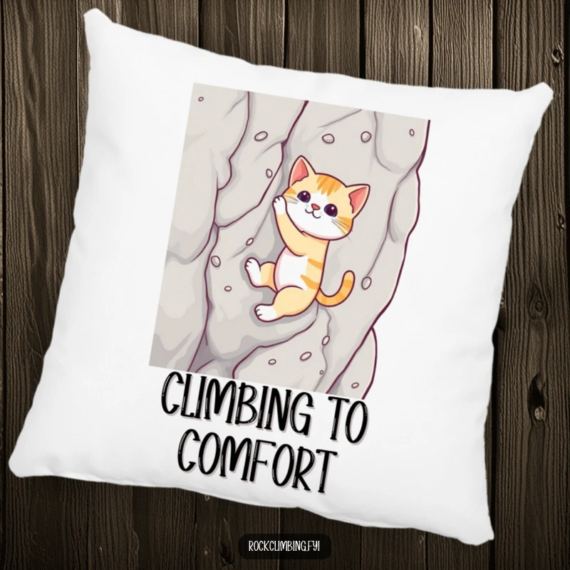 Funny cat pillow showing a cat skillfully climbing a rock face with suction cups, bringing humorous comfort.