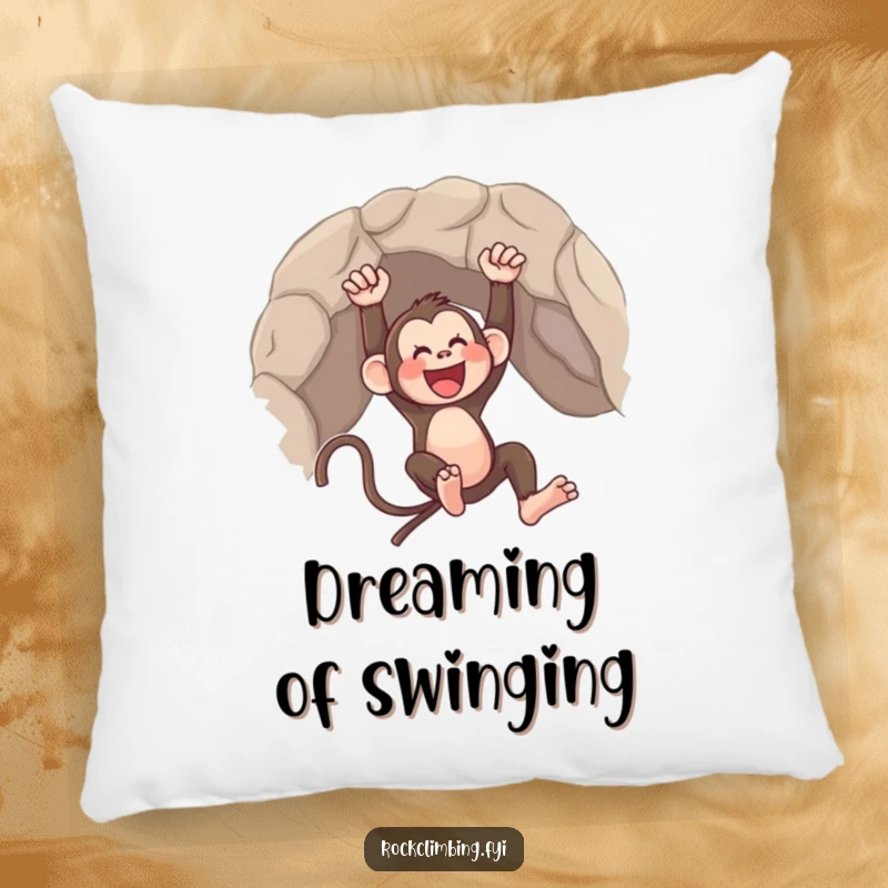 Funny pillow featuring a happy monkey swinging freely from a rocky ledge, adding a touch of playful whimsy.