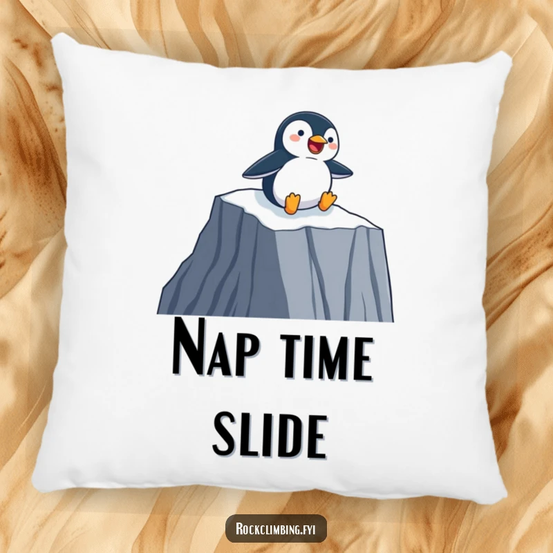 Funny Pillow featuring a happy penguin joyfully sliding down a sheer cliff face on its belly, adding soft humor and fun.