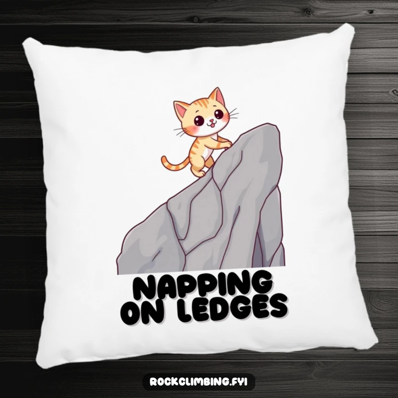 Funny cat pillow with a winking cat climbing a cliff, offering snuggly comfort and a dose of feline humor.