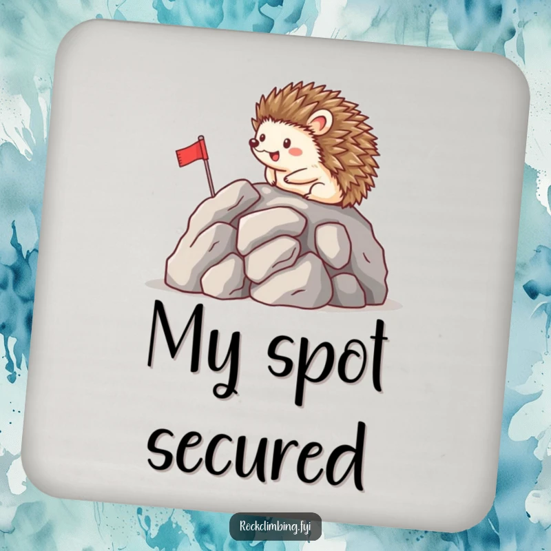 Funny drink coaster featuring a happy hedgehog planting a flag on a rocky peak, adding a humorous touch of achievement.