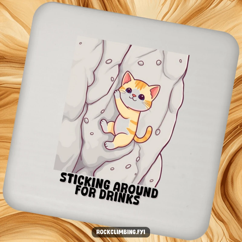 Funny cat coaster depicting a cat using suction cups to climb a rock, adding humorous protection.