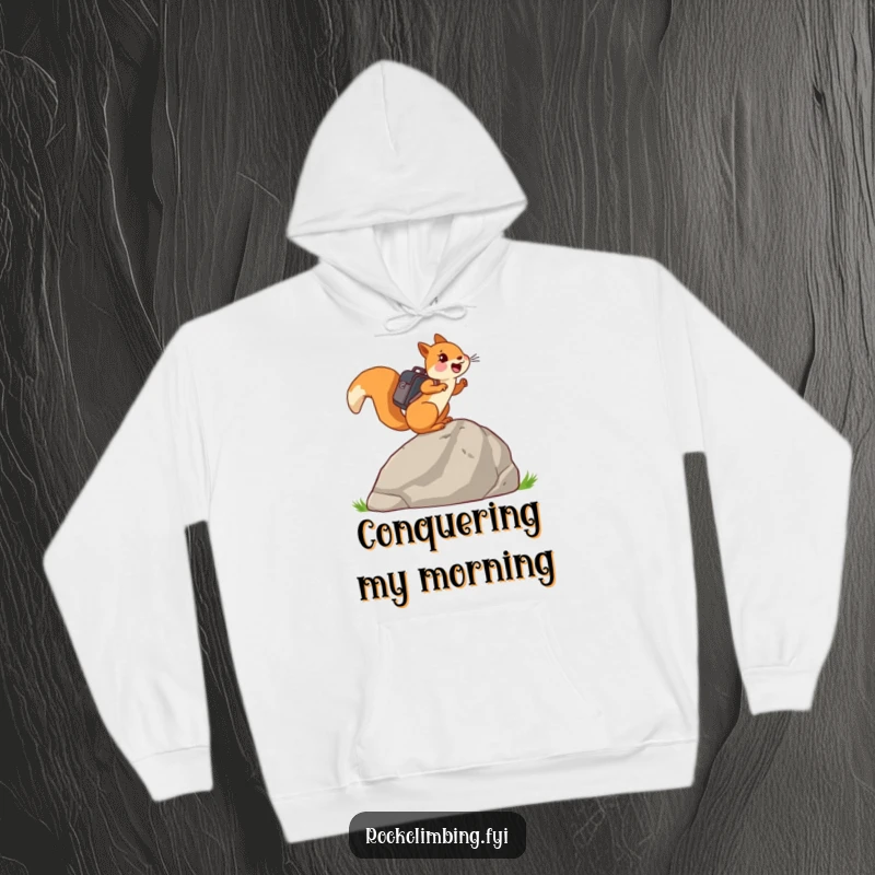 Funny joyful squirrel with a tiny backpack, climbing a large rock, depicted on a cozy hoodie.