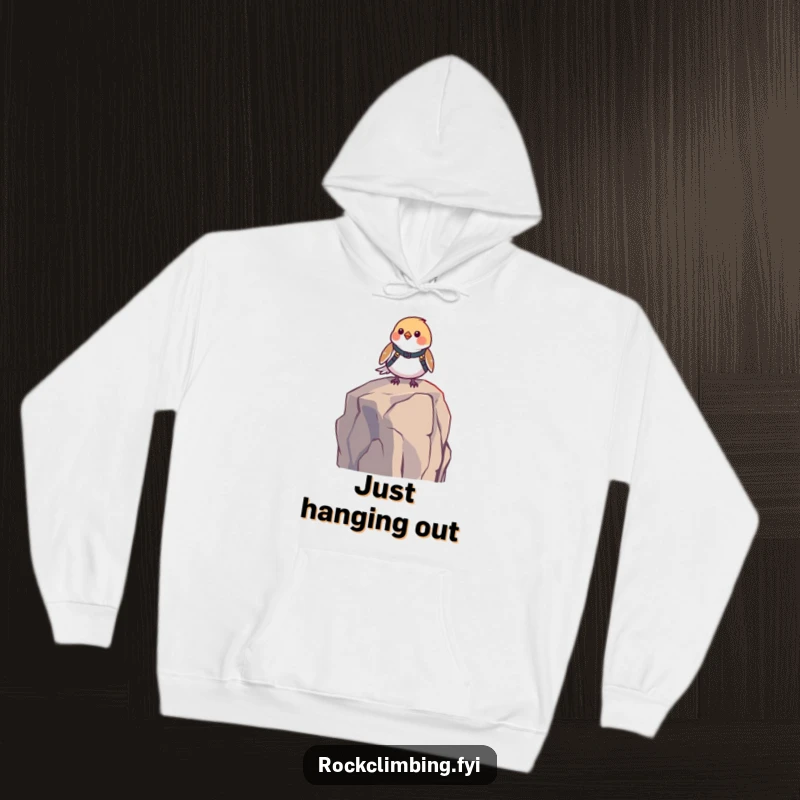 Funny bird harness hoodie depicting a small bird in a harness, sitting on a high rock with a determined look. A warm, humorous clothing gift.