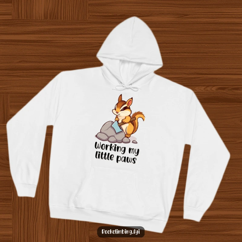 Funny hoodie featuring a determined chipmunk mining a rock with a pickaxe, offering warmth and humorous encouragement for hard work.