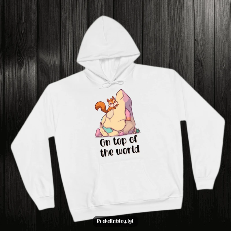 Funny giddy squirrel hoodie featuring a happy squirrel climbing a colorful cartoon rock, promoting adventure.