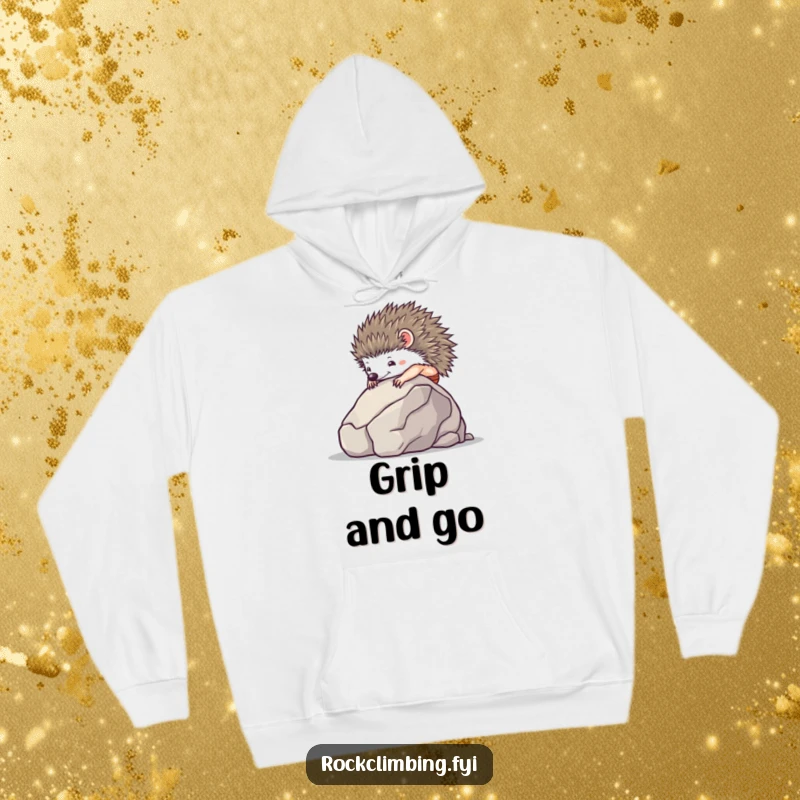 Funny tiny hedgehog using suction cups to climb a smooth boulder, featured on a soft hoodie.