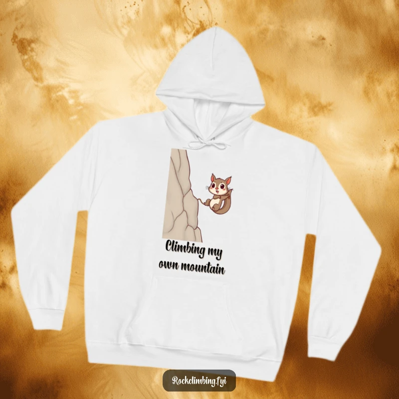 Funny squirrel hoodie showing a determined rodent using a rope to ascend a difficult, sheer cliff, inspiring with its tenacity.
