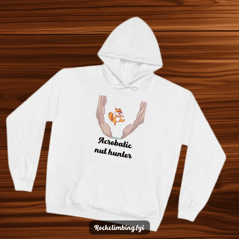 Funny determined squirrel leaping joyfully mid-air between rocks, depicted on a cozy, warm hoodie.