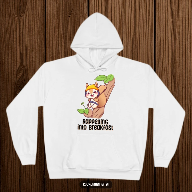 Funny squirrel wearing a protective helmet rappelling down a small sprout, printed on a cozy hoodie, ideal for adventurers.