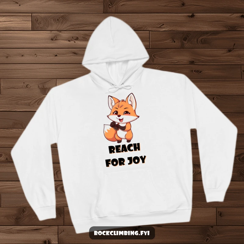 Funny charming fox reaching for a difficult handhold with intense focus and joy, embodying outdoor passion, cozy hoodie.