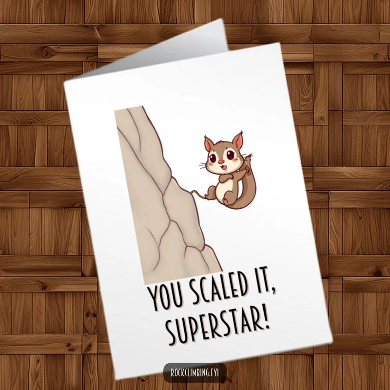 Funny Free Printable Congratulations Card: Squirrel heroically ascends a sheer cliff with a rope, celebrating success.