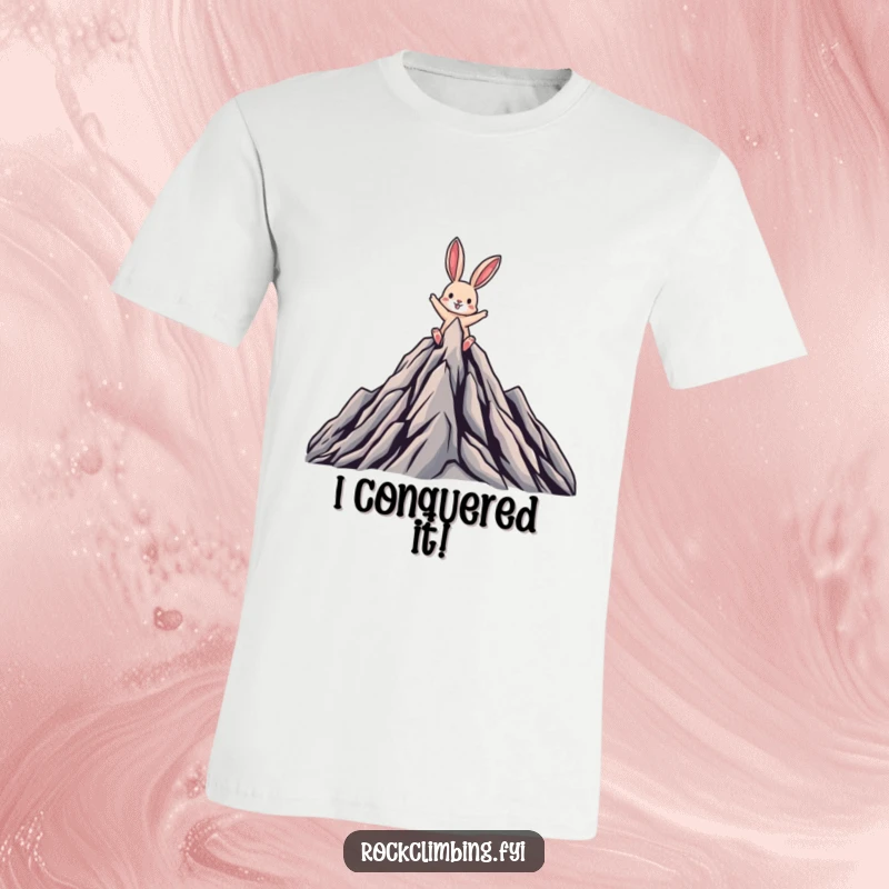 Funny t-shirt with a triumphant rabbit standing on a stylized mountain peak, arms raised in a victorious, celebratory pose.
