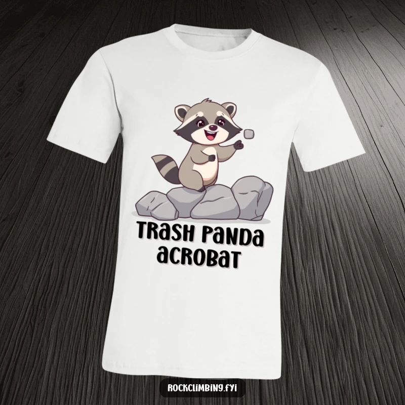 Funny raccoon t-shirt featuring a giggling raccoon juggling small rocks while climbing, conveying a sense of fun and playful skill.