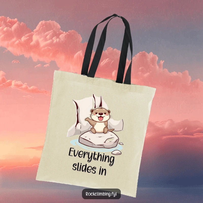 Funny otter tote bag featuring a joyful otter sliding down a rock face on a stone, ideal for carrying items with a humorous theme.
