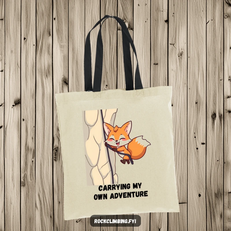 Funny Fox Rappelling Tote Bag: A playful fox with a wink rappels down a rocky cliff, practical and humorous.