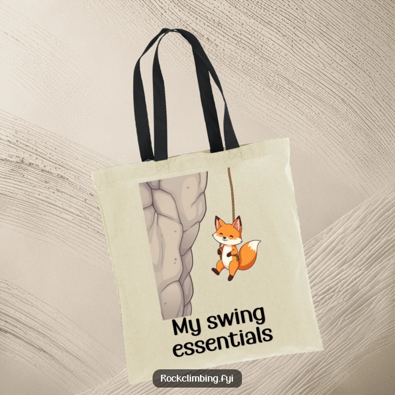 Funny Fox Tote Bag: A playful fox dangles from a rope swing, high on a crag, bringing whimsical charm everywhere.