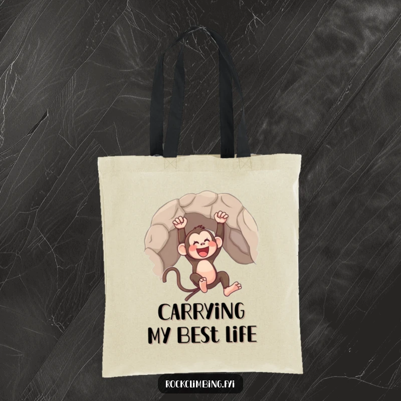 Funny tote bag showcasing an ecstatic monkey swinging from a rocky outcrop, a symbol of lively spirit.
