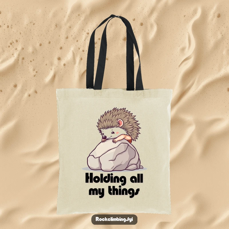 Tiny hedgehog using suction cups to climb a smooth boulder, on a practical and stylish tote bag.